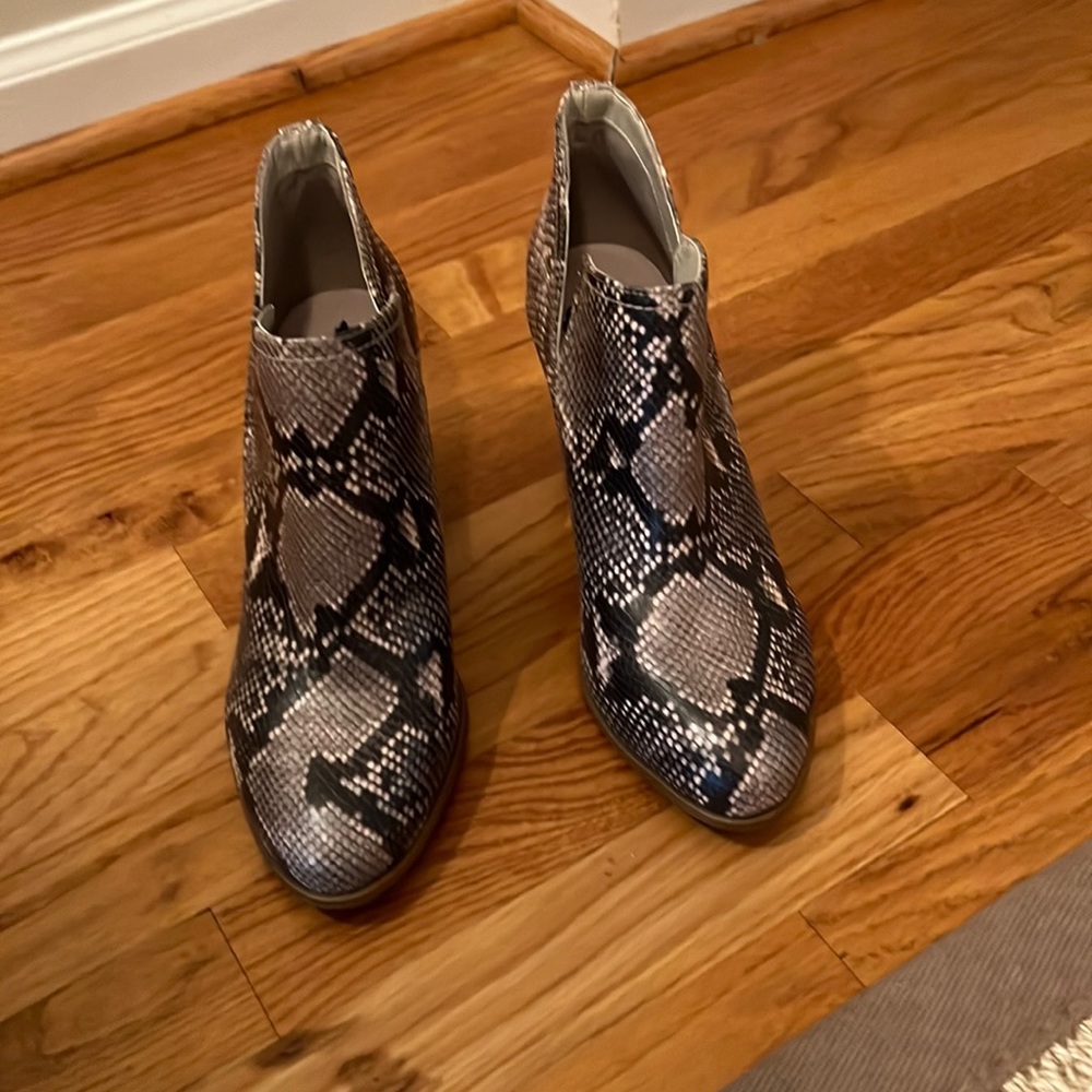Snake skin bootie.  Never been worn.